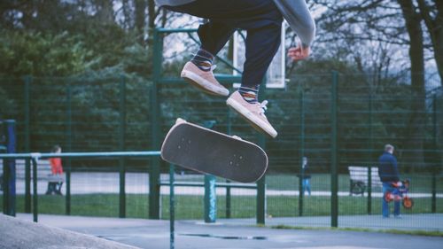 Low section of man playing in park