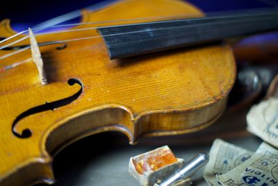 High angle view of guitar on table