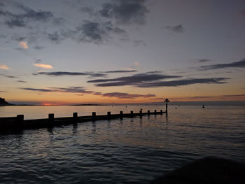 Scenic shot of calm sea at sunset