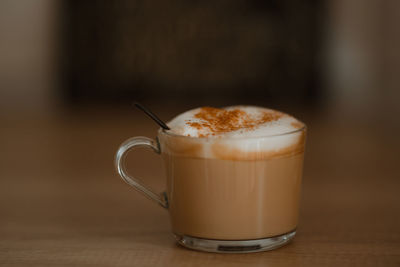 Close-up of coffee cup on table