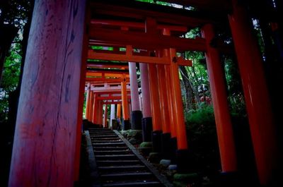 Red columns in front of building