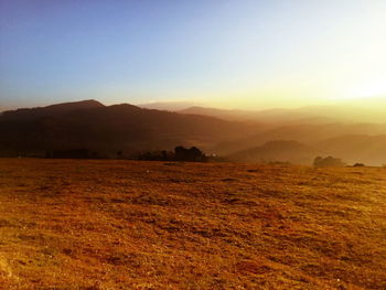 Scenic view of mountains at sunset