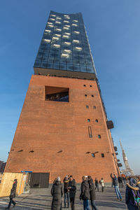 Low angle view of building against blue sky