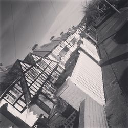 Tilt image of buildings against sky