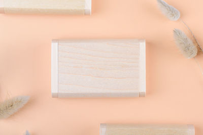 High angle view of objects on yellow background