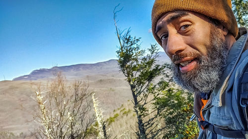 A hiker at lost cove cliffs trail in the pisgah national forest