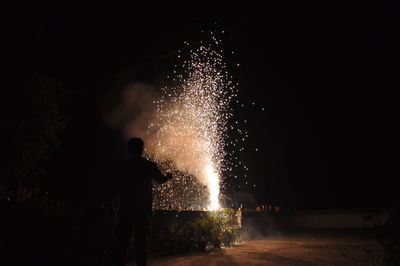 Firework display at night