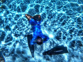 High angle view of person swimming in pool