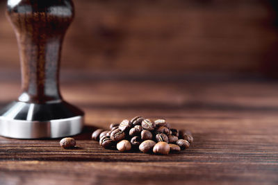 Close-up of coffee beans on table