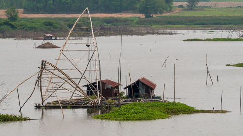 Scenic view of lake against building