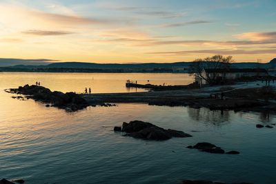 Scenic view of sea against sky during sunset