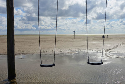 Scenic view of beach against sky