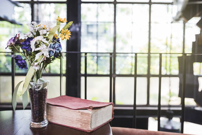 Close-up of flower vase on table