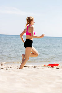 Full length of woman on beach