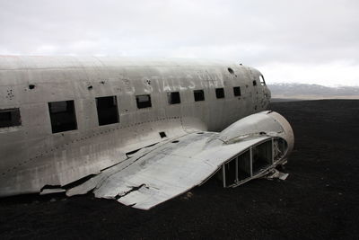 Abandoned airplane on beach