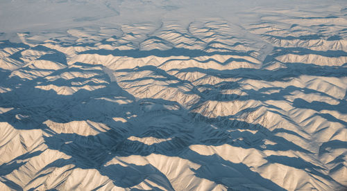 High angle view of shadow on sand