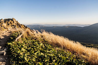 Scenic view of mountains against clear sky