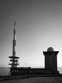 Low angle view of industry against clear sky