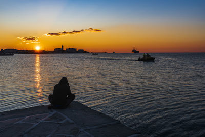 Scenic view of sea against sky during sunset