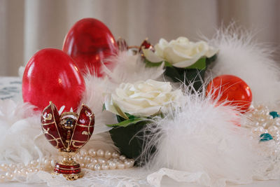 Close-up of christmas decorations on table at home