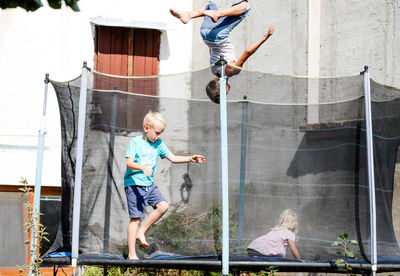 Children playing in trampoline