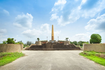 View of temple against cloudy sky