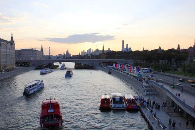 View of bridge over river against cloudy sky