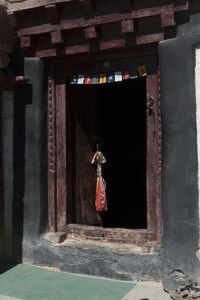 Full length of man standing in corridor