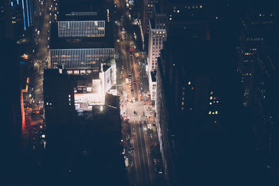 High angle view of illuminated buildings at night