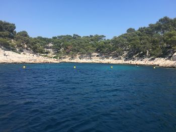 Scenic view of sea against clear sky