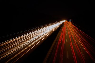 Light trails on road at night