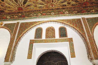 Low angle view of ornate ceiling in historic building