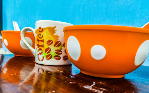 Close-up of coffee cup on table