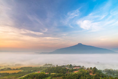 Scenic view of mountains against sky during sunset