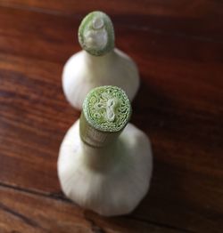 High angle view of garlic bulbs on table