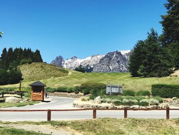 Scenic view of landscape against clear blue sky