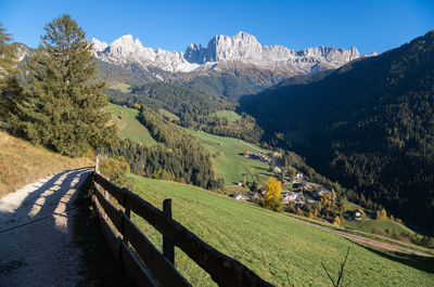 Scenic view of landscape and mountains against sky