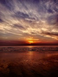 Scenic view of sea against dramatic sky