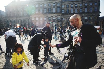 People on street in city