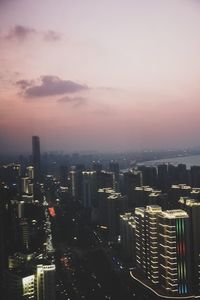 High angle view of buildings against sky during sunset