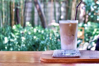 Close-up of coffee on wooden table