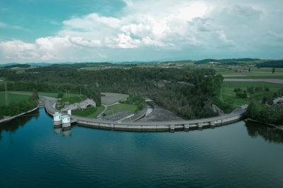 High angle view of lock lake against sky with clouds