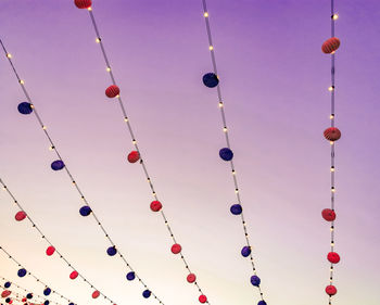 Low angle view of cables against sky