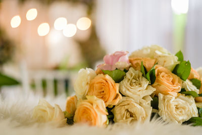 Close-up of roses on table