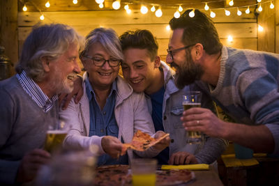 Group of people in drinking glass