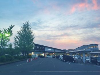 Road against cloudy sky at sunset