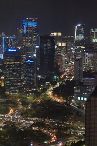 High angle view of illuminated buildings at night