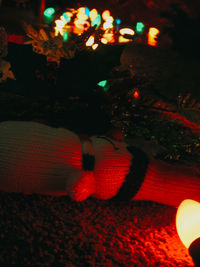 Close-up of illuminated christmas lights at night