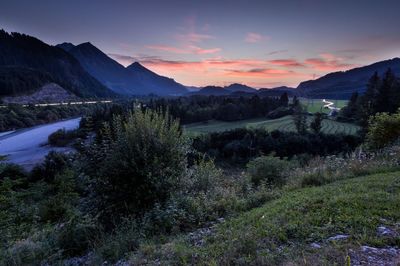 Scenic view of landscape against sky during sunset