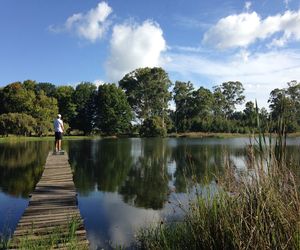 Reflection of people in lake